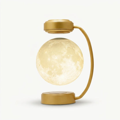 Zentrolia levitating moon lamp floating above a gold base
