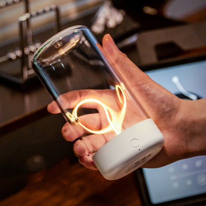 Zentrolia rechargeable LED filament night light glowing warmly on a bedside table
